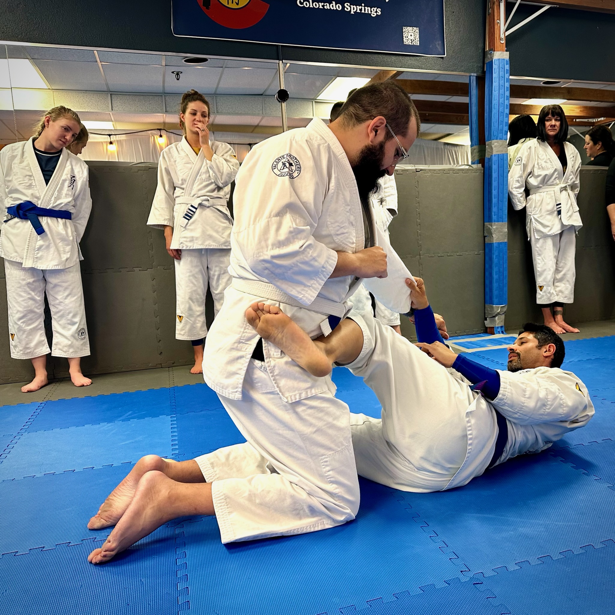 Working on our Jiu Jitsu craft with our students.