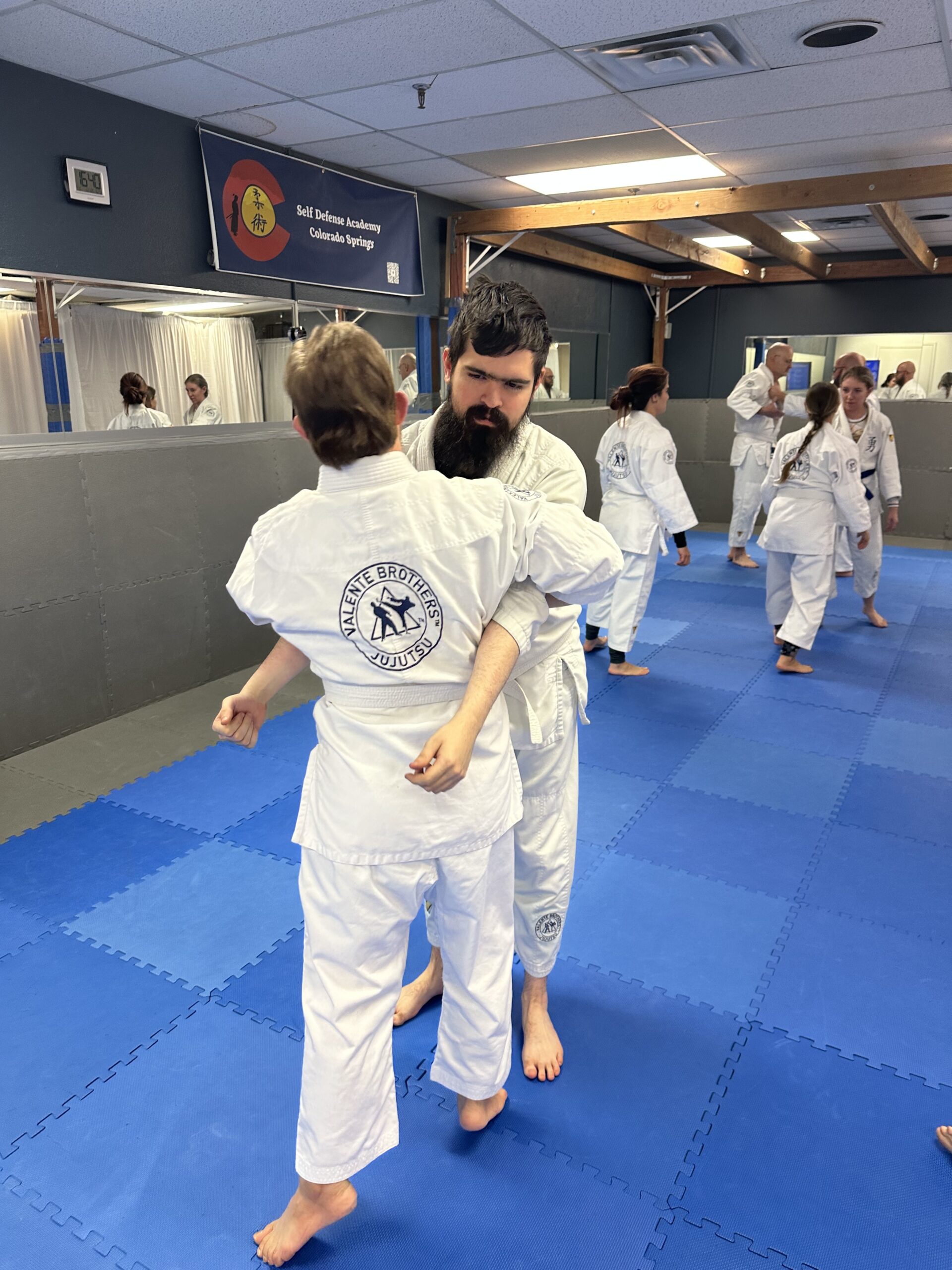 Mathias & Nick training bear hug defenses!