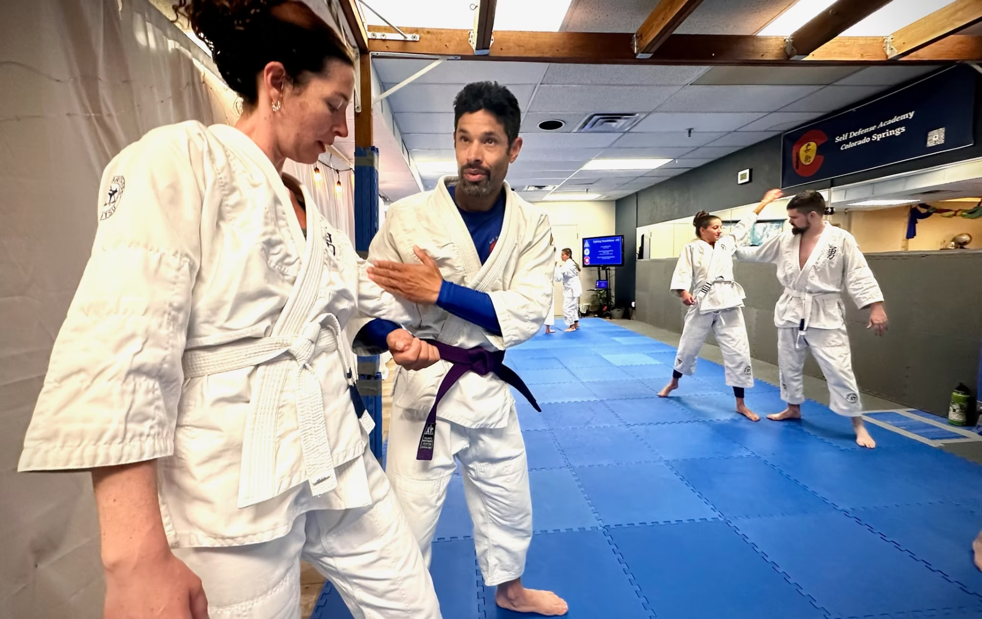 Flip instructing during fighting foundations class